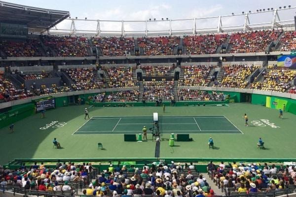 The Australian Open is still set to go on in 2021! Tennis fans, here's your guide to catch all the action on live stream sites and TV channels.